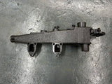 Mack E7 WATER MANIFOLD PART # 107GC550M, W/ OIL FILTER HEAD PART # 32GB354P